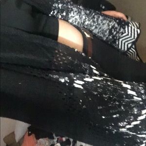 A black patterned cardigan.